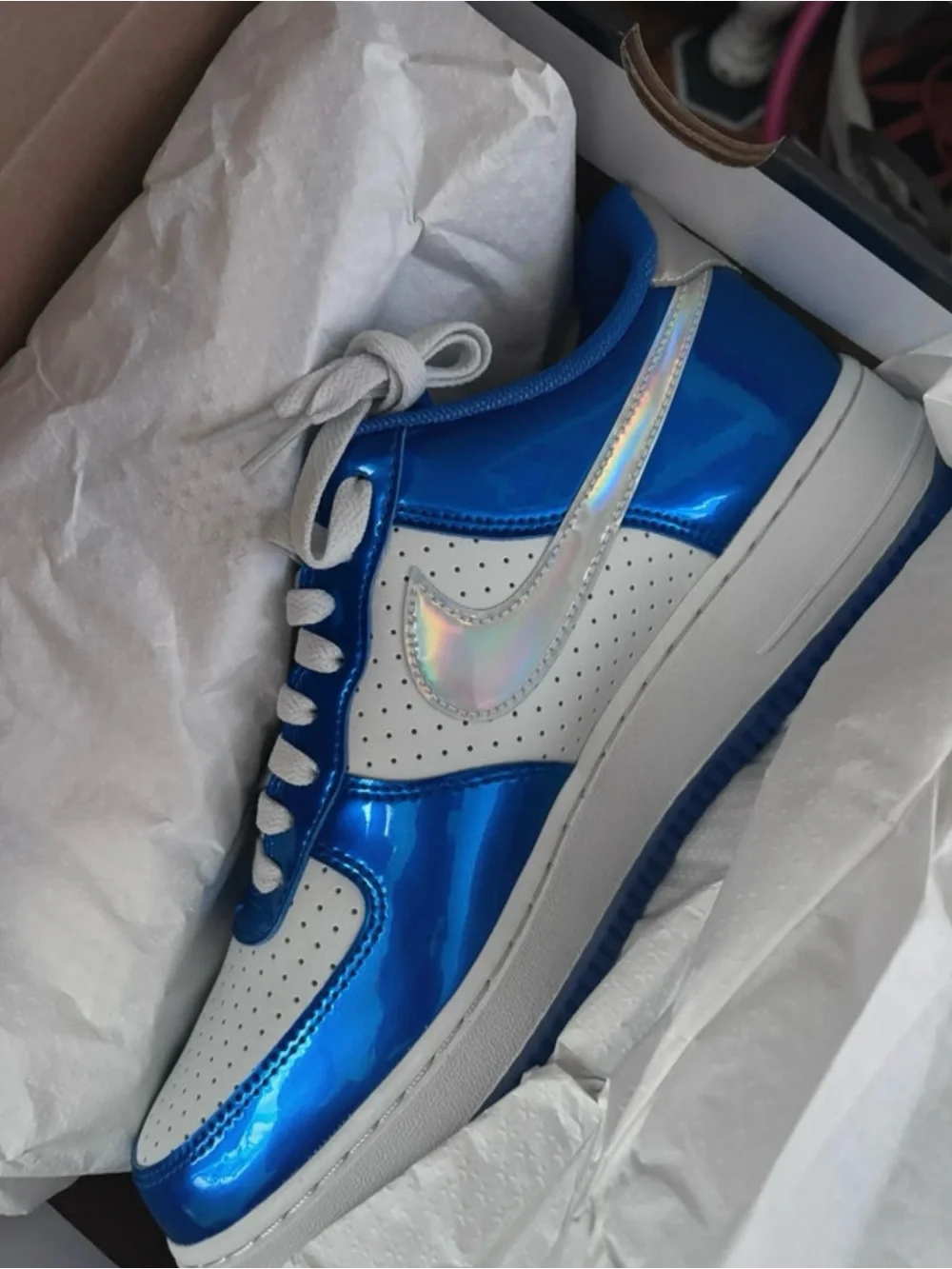 Nike Low-Top Sneakers in Bright Blue and White with Iridescent Swoosh